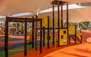 yellow playgrounds with orange mat